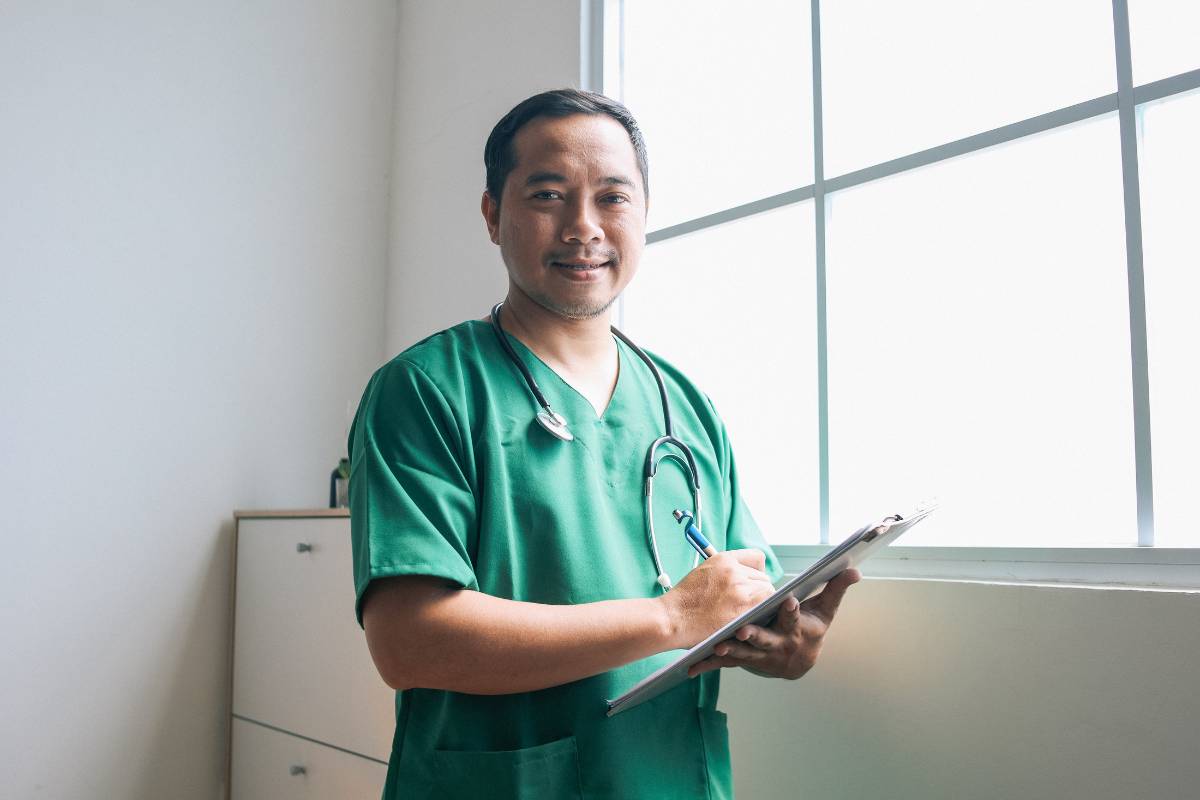 A nurse works on his Oklahoma Board of Nursing license renewal.