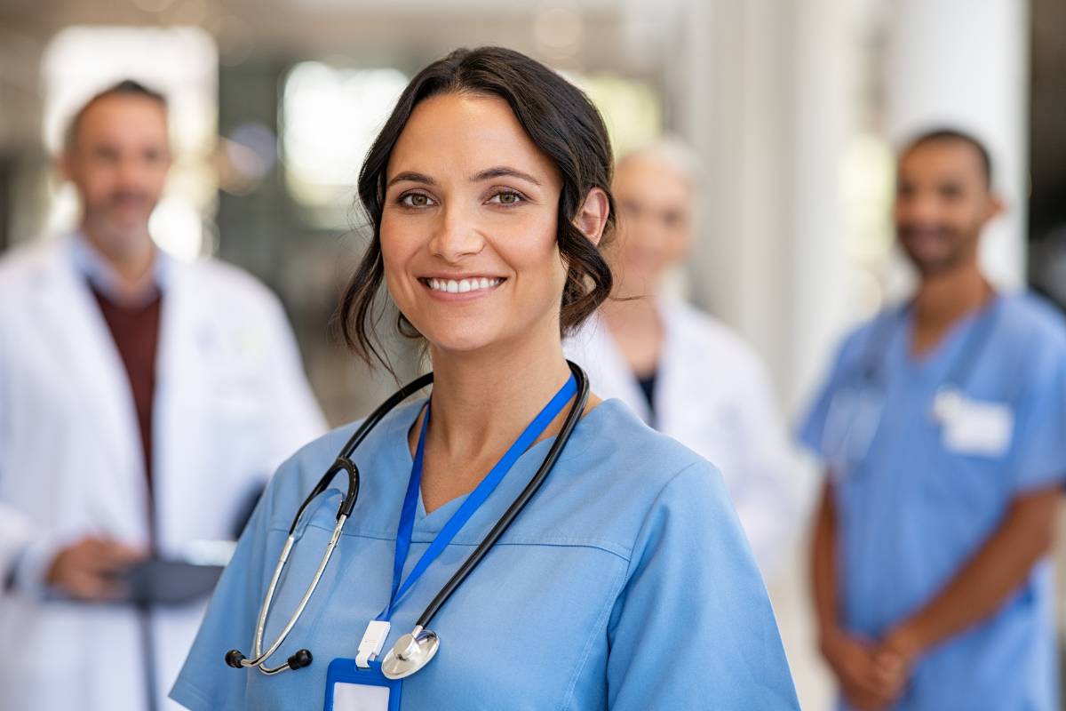 A nurse uses her clinical nurse specialist skills at work.