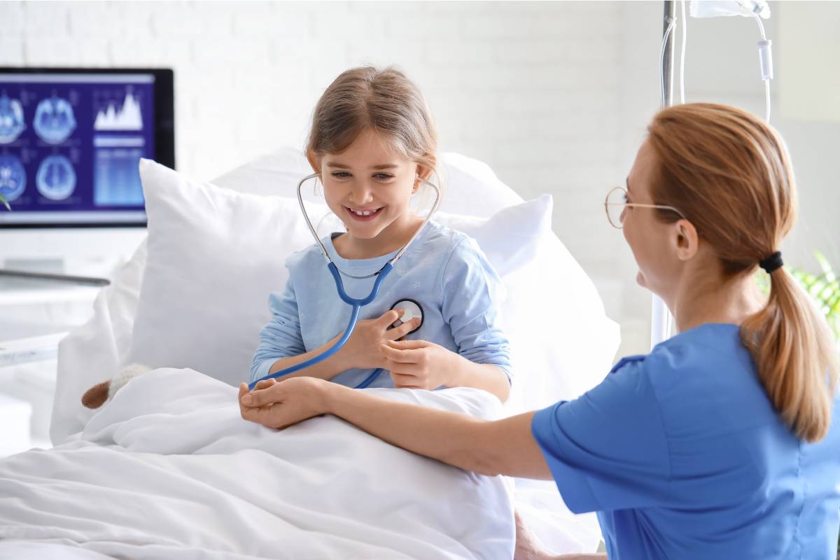 A nurse with CPEN certification assesses a pediatric patient.