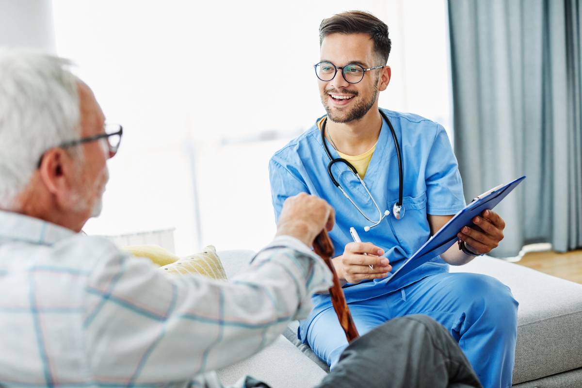 A man uses his nursing skills in one of the free CNA reciprocity states.