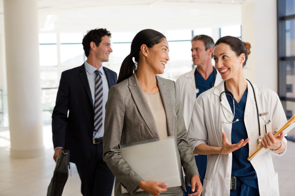 Group of professionals talking in a medical facility