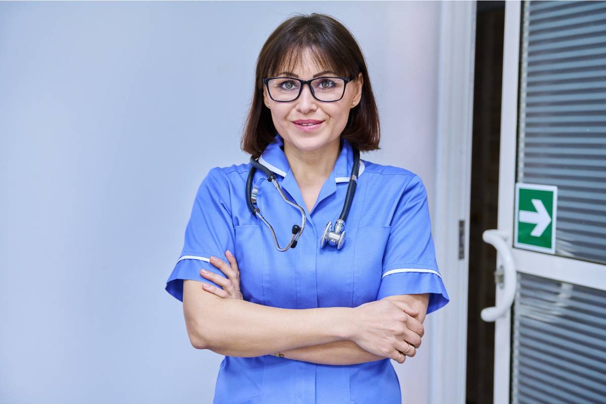 A nurse poses for a photo while discussing how to become an RN in Missouri.