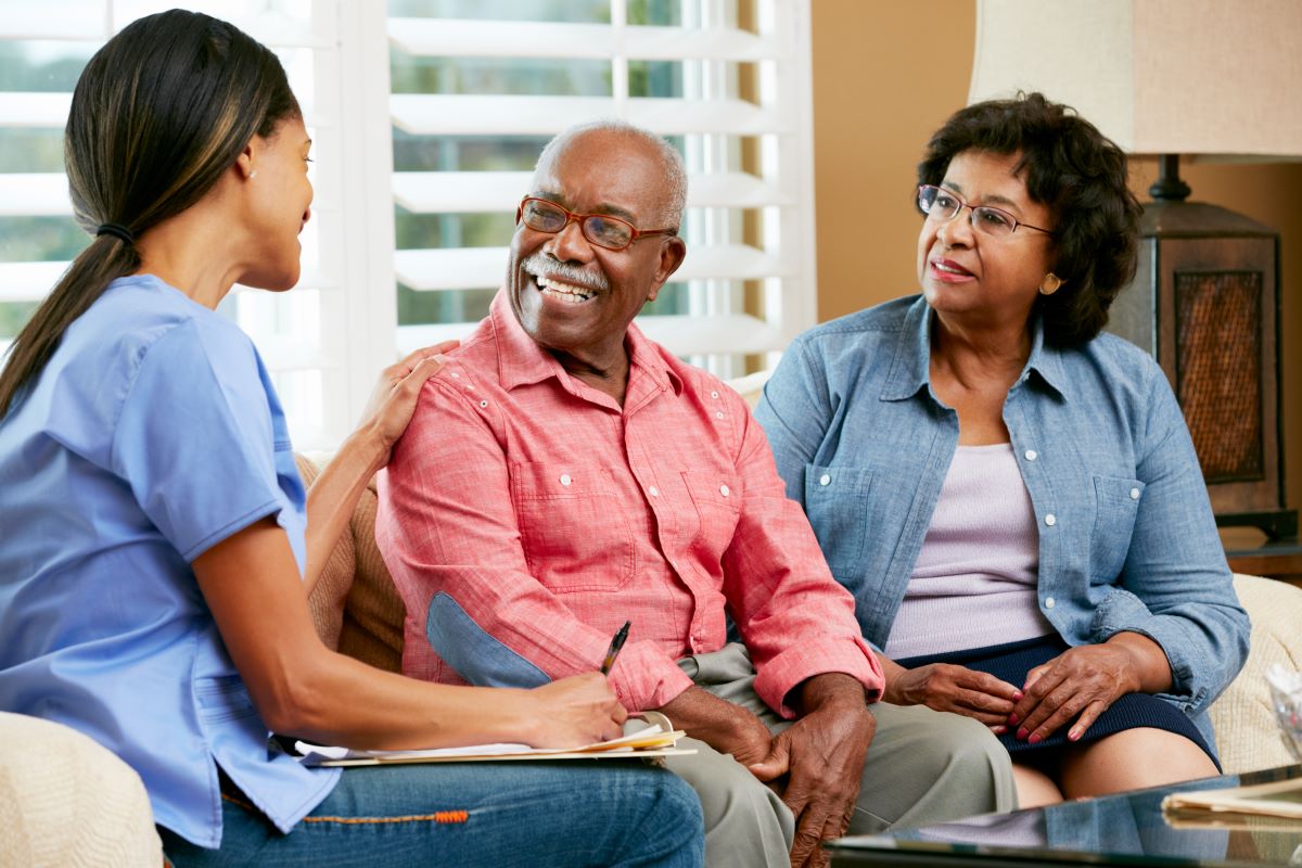 A happy and well cared-for couple at a nursing home that has solved its nurse turnover problem.