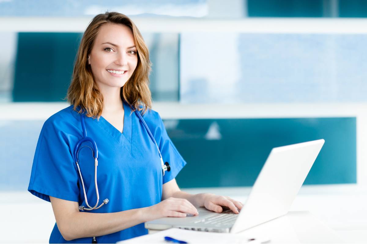 A nurse works on her Indiana nursing license renewal process.