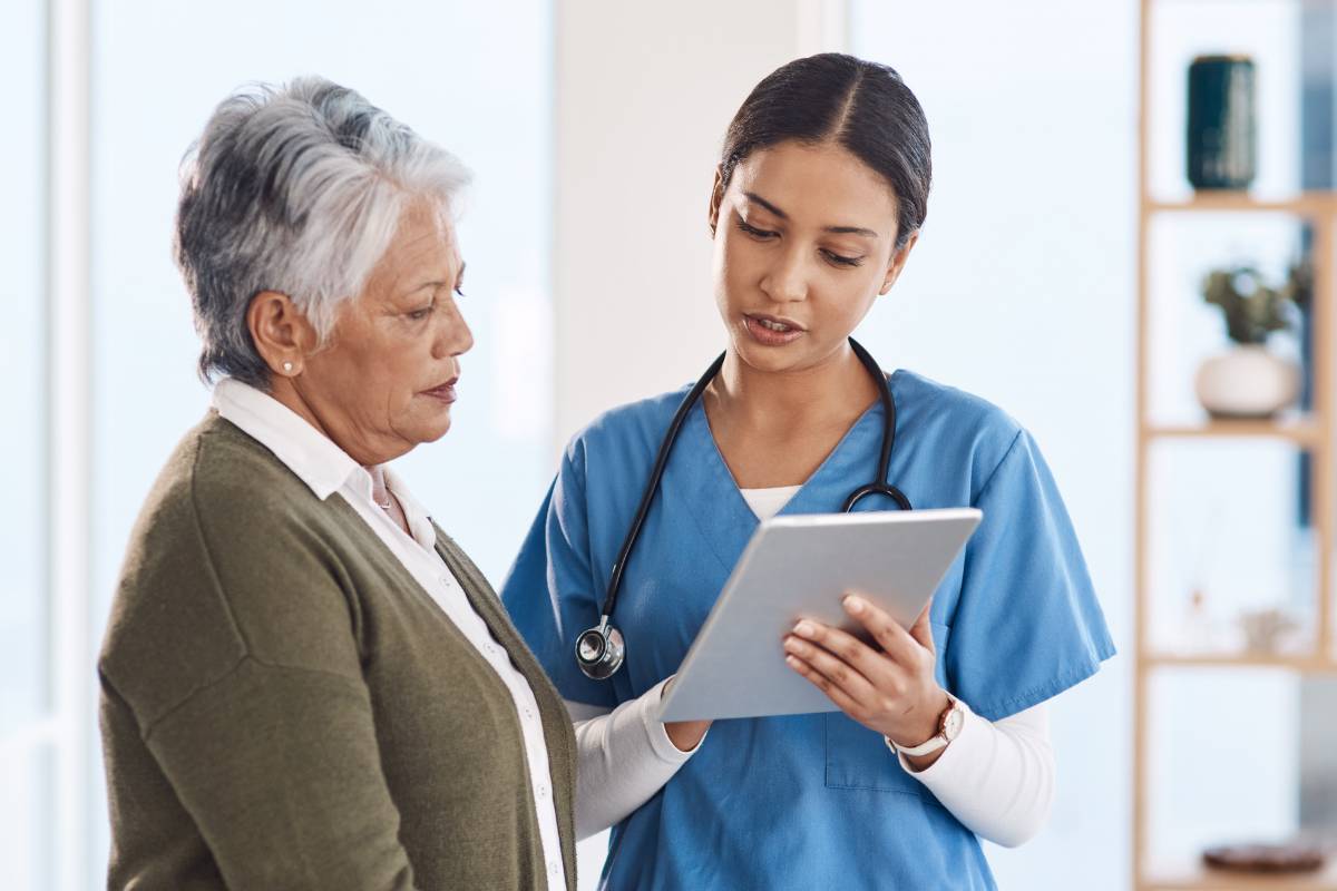 A nurse speaks with a patient about medical misinformation they had questions about.