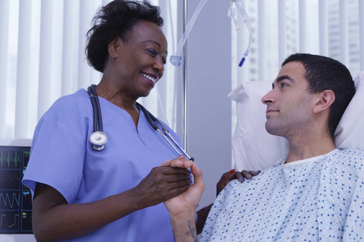 A nurse provides compassionate care that displays why nursing tops the rankings for the most trusted professions.