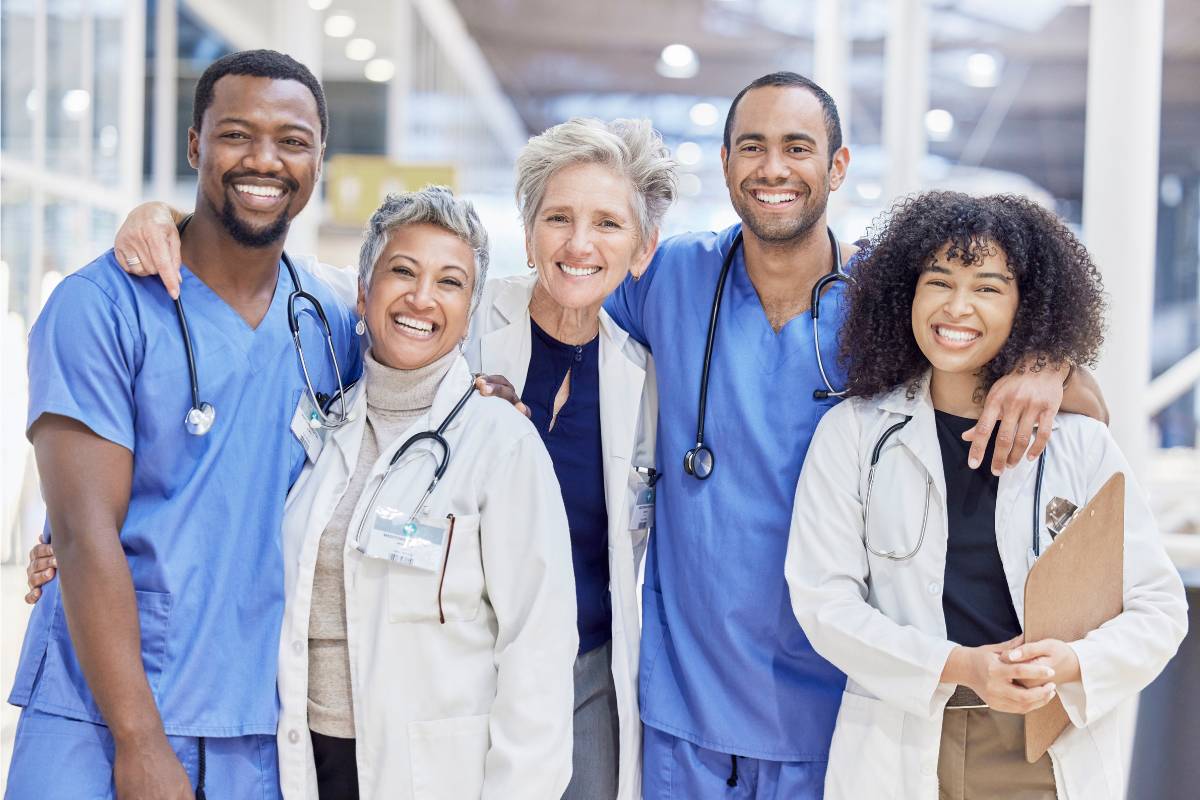 A group of healthcare professionals discuss NP vs. PA career options.