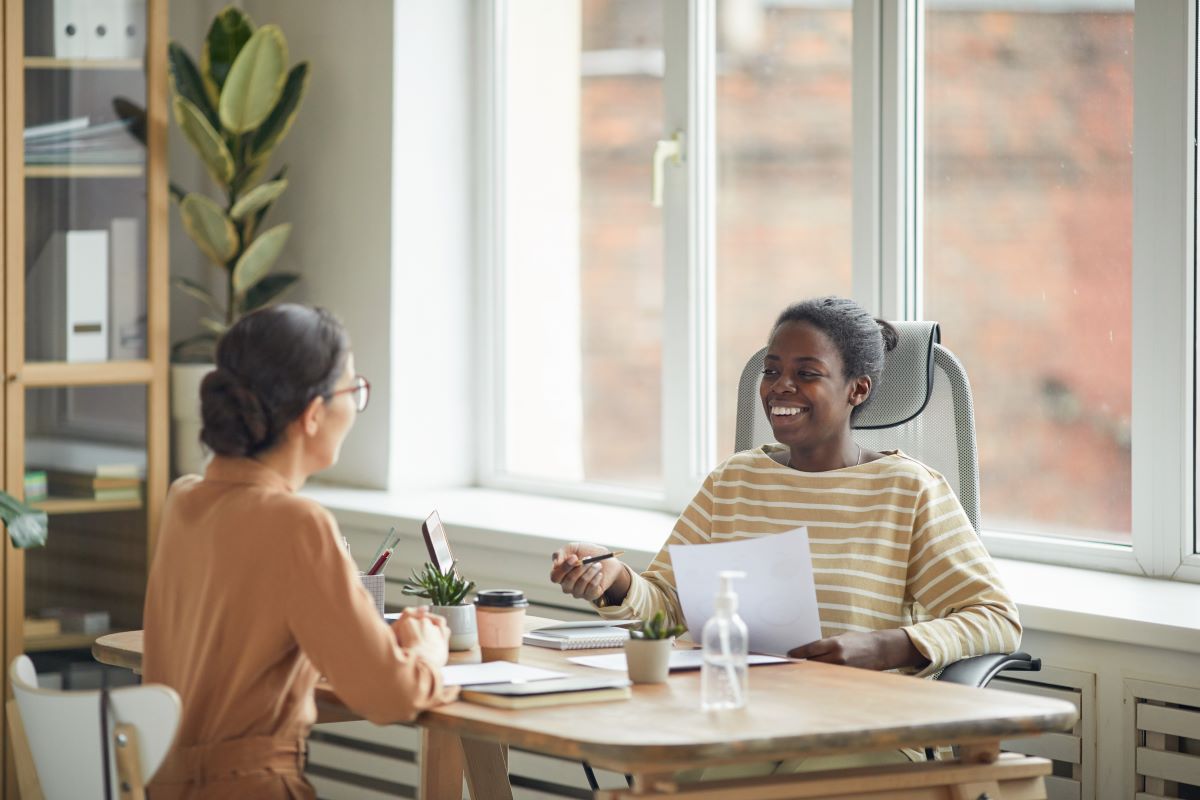 A nurse recruiter interviewing a job candidate.