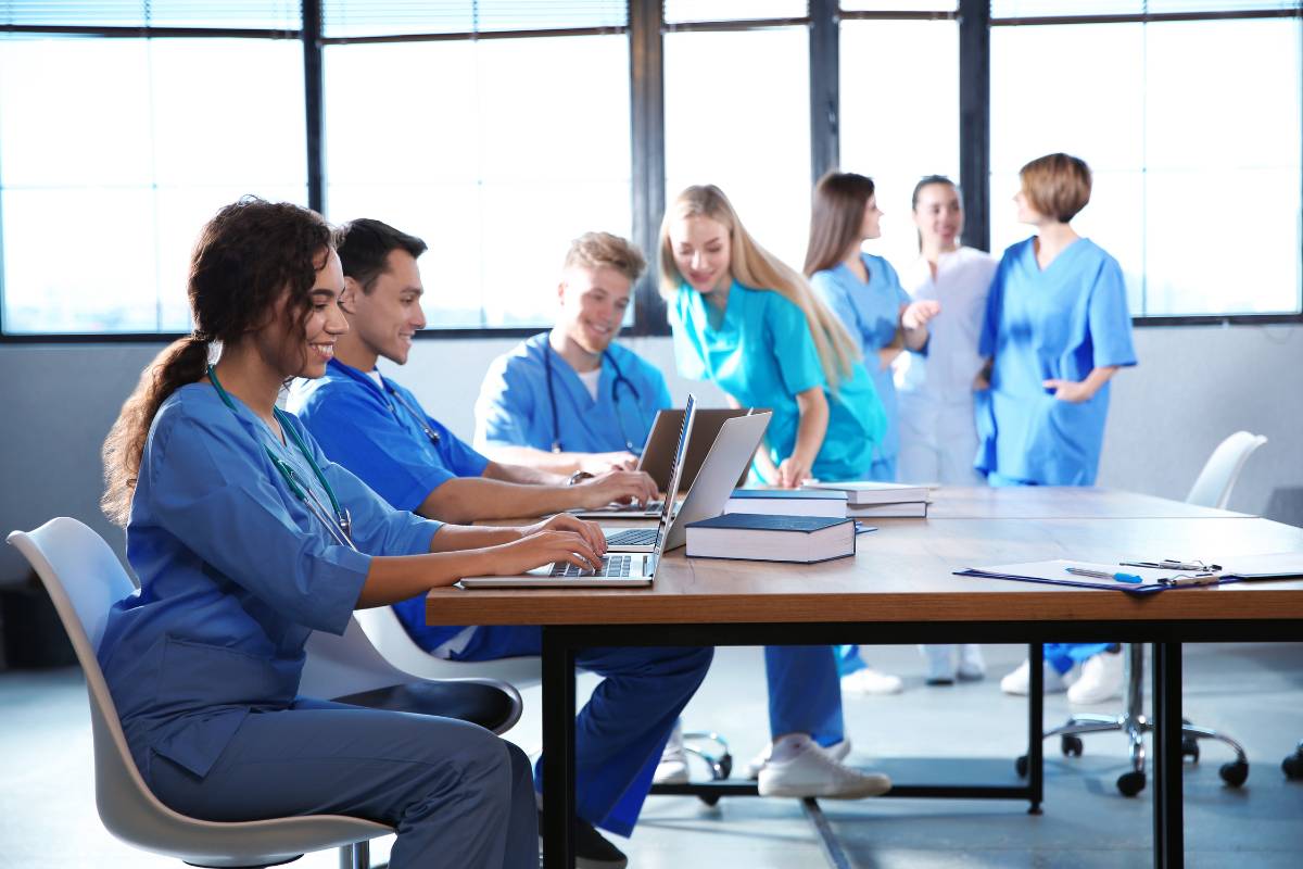A student researches nursing scholarships to pay for school.