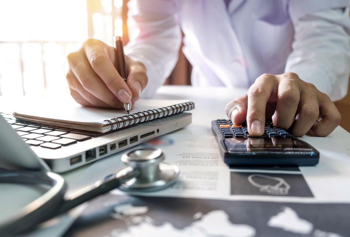 A healthcare worker using the RBRVS to calculate billing amounts.