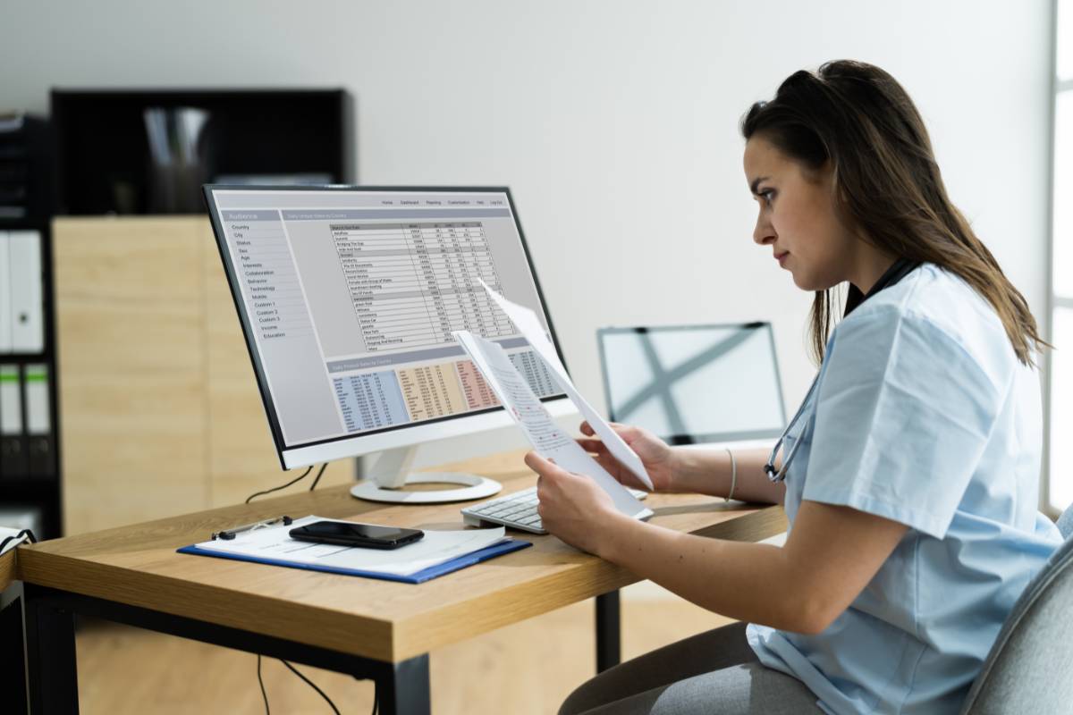 A nurse works on their RN case manager cover letter.