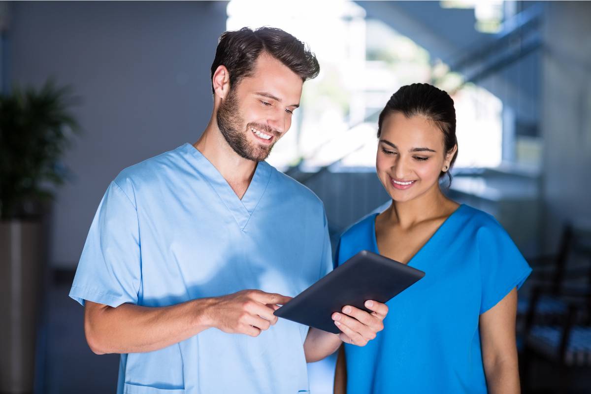 Two nurses research how to go from RN to PA career paths.