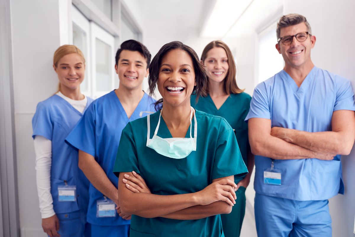 A team of nurses poses for the camera.