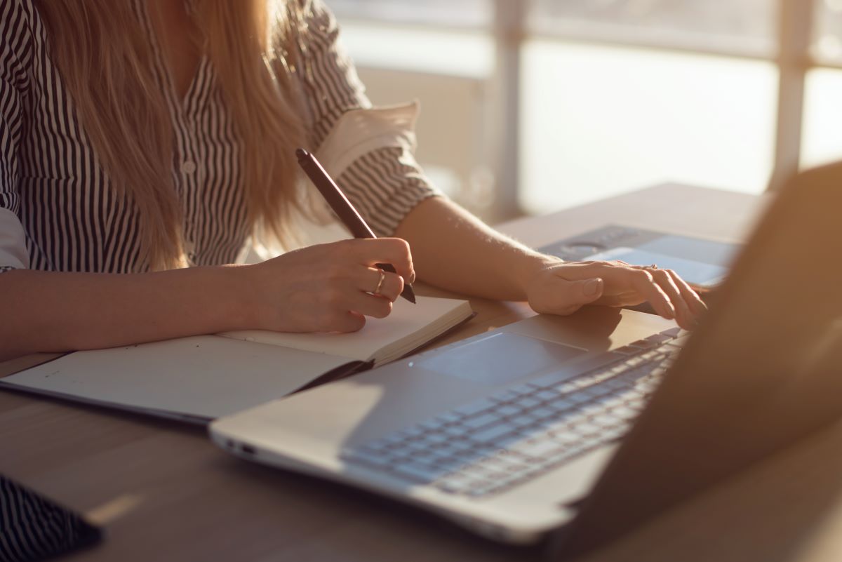 Writing a cover letter on a laptop